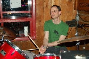Peter"Sticks" Kaufman playing drums at Questionable Authorities'' 2011 graduation gig at Snug Harbor.