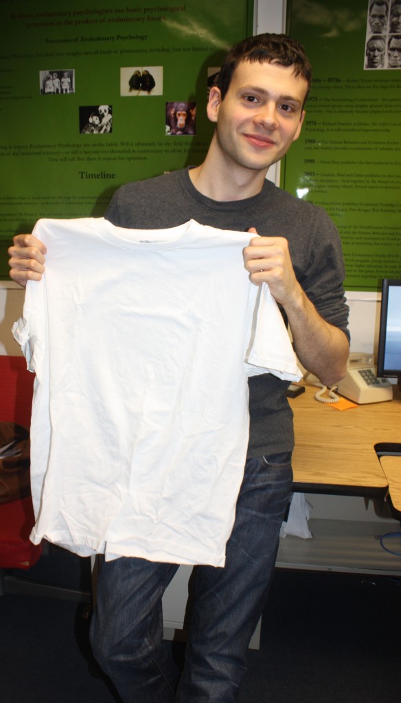 Grant Trouton holding t-shirt