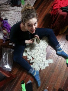 Lara Russo with the cash found stashed in the couch