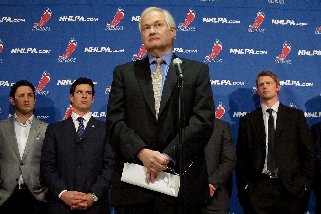NHLPA head Donald Fehr with players. Photo courtesy of Richard Budman. 