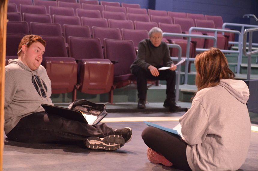 Working lines while sitting down helps the actors get a better feeling for the words. Photo by Jillian Nadiak.