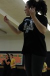 A student feeling the burn during zumba class. Photo by Kate Bunster.