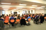 Cameron Kirkpatrick speaks to a full crowd about his affliction with Asperger’s Syndrome. Photo by Audrey Brand.
