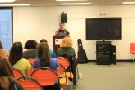 Cameron Kirkpatrick speaks to a full crowd about his affliction with Asperger’s Syndrome. Photo by Audrey Brand.
