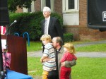 Rev. Anderson of Redeemer Evangelical Church in New Paltz and his two children, along with Donald P. Christian (Rear) at Friday's ceremony. Photo by Justin Sarjeant.