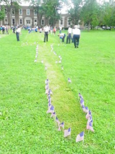 Flags lining the Old Main Quad. Photo by Justin Sarjeant.