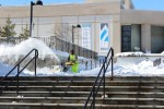 SUNY New Paltz employee plowing paths to the Student Union. Photo by Kate Bunster.