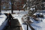 A student walking to Hasbrouck Dining Hall in the snow. Photo by Kate Bunster.