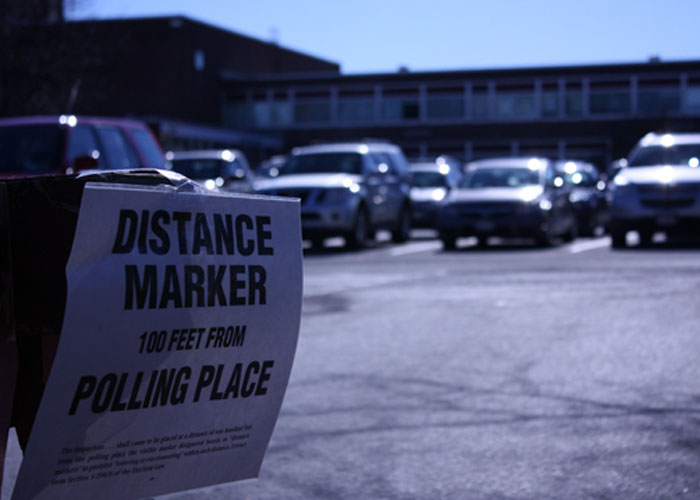 New Paltz residents get ready to vote at New Paltz Middle School. Photo by Michelle Feliciano