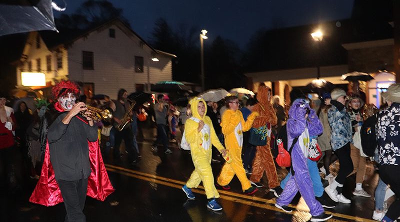 People of all ages walk in the annual Halloween parade on Main Street. All are invited to march.